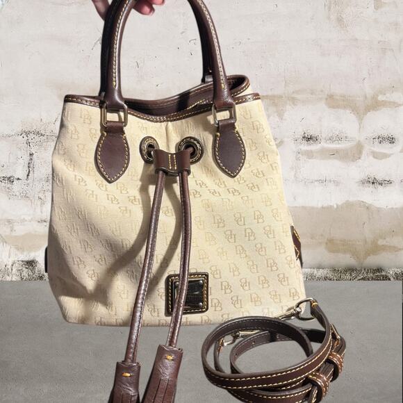 Dooney & Bourke Signature Print Drawstring Bucket Bag Beige with Leather Trim